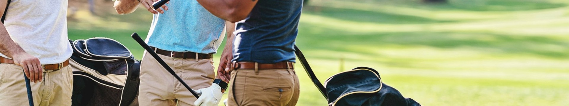 3 lads enjoying a game of golf on a stag do