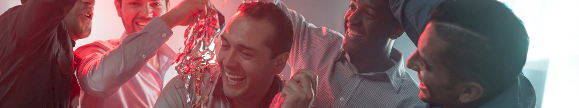 Five males in a bar enjoying a stag weekend