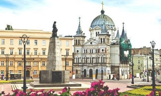 Cloudy skies over the Catholic Church of Pentecost. Discover Lodz Stag Party ideas below:
