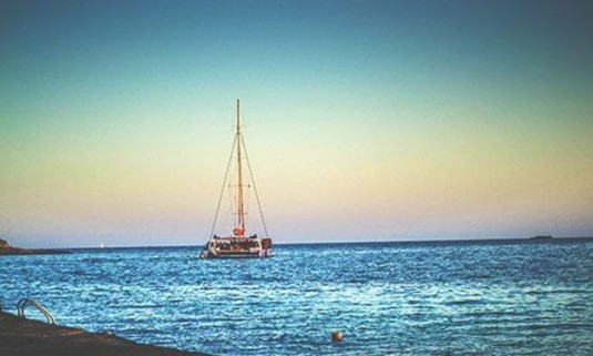 Sunset catamaran cruise on the ocean. Discover more Magaluf Stag Party ideas below:
